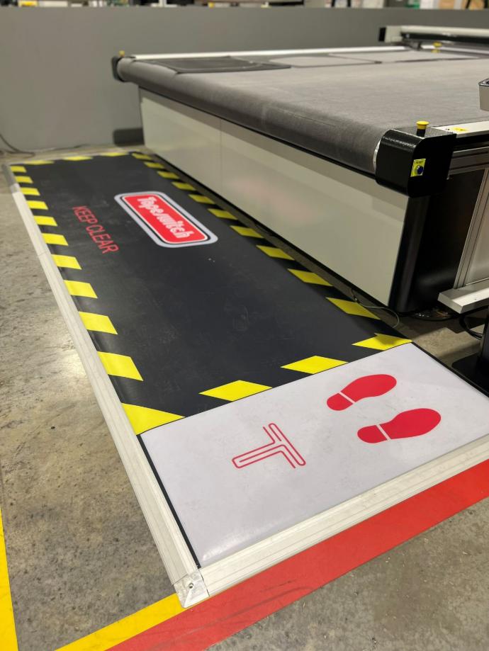 Tapeswitch schakelmat bij machine